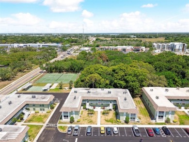 Welcome to this 1-bedroom, 1-bath oasis in Tarpon Springs on Tarpon Springs Golf Course in Florida - for sale on GolfHomes.com, golf home, golf lot