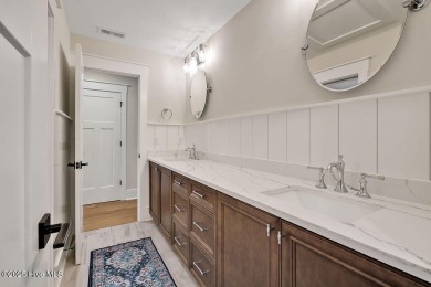Welcome to 5083 Creswell Drive, a true gem located in the highly on Cape Fear National At Brunswick Forest in North Carolina - for sale on GolfHomes.com, golf home, golf lot