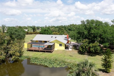 Country Living in this large 4/2/2 home on Lake Suncoast.  Bring on Maple Leaf Golf and Country Club in Florida - for sale on GolfHomes.com, golf home, golf lot