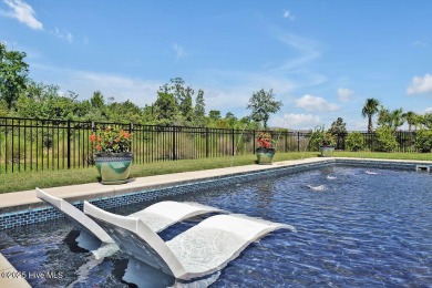 Welcome to 5083 Creswell Drive, a true gem located in the highly on Cape Fear National At Brunswick Forest in North Carolina - for sale on GolfHomes.com, golf home, golf lot