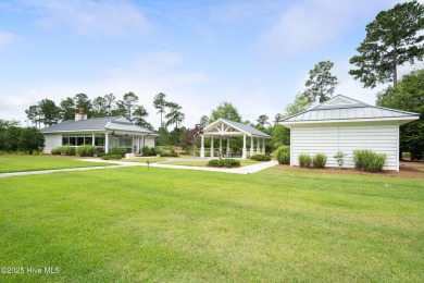 Welcome to 5083 Creswell Drive, a true gem located in the highly on Cape Fear National At Brunswick Forest in North Carolina - for sale on GolfHomes.com, golf home, golf lot