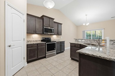 Welcome home! Tucked away in the quiet, low-HOA North Village on Palmetto Greens Golf and Country Club in South Carolina - for sale on GolfHomes.com, golf home, golf lot