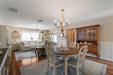 GORGEOUS, TURNKEY 2/2 Loredo with ENCLOSED, CLIMATE-CONTROLLED on The Links of Spruce Creek in Florida - for sale on GolfHomes.com, golf home, golf lot