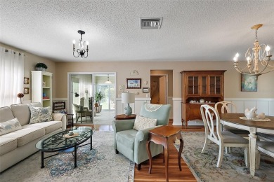 GORGEOUS, TURNKEY 2/2 Loredo with ENCLOSED, CLIMATE-CONTROLLED on The Links of Spruce Creek in Florida - for sale on GolfHomes.com, golf home, golf lot