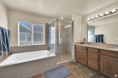 This rambler is located in a great community. Your backyard is on Cranefield Golf Course in Utah - for sale on GolfHomes.com, golf home, golf lot