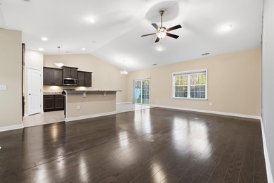 Welcome home! Tucked away in the quiet, low-HOA North Village on Palmetto Greens Golf and Country Club in South Carolina - for sale on GolfHomes.com, golf home, golf lot