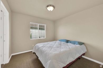 This rambler is located in a great community. Your backyard is on Cranefield Golf Course in Utah - for sale on GolfHomes.com, golf home, golf lot