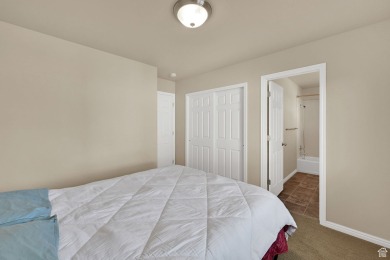 This rambler is located in a great community. Your backyard is on Cranefield Golf Course in Utah - for sale on GolfHomes.com, golf home, golf lot