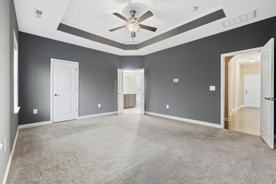 Welcome home! Tucked away in the quiet, low-HOA North Village on Palmetto Greens Golf and Country Club in South Carolina - for sale on GolfHomes.com, golf home, golf lot