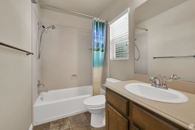 This rambler is located in a great community. Your backyard is on Cranefield Golf Course in Utah - for sale on GolfHomes.com, golf home, golf lot
