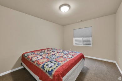 This rambler is located in a great community. Your backyard is on Cranefield Golf Course in Utah - for sale on GolfHomes.com, golf home, golf lot