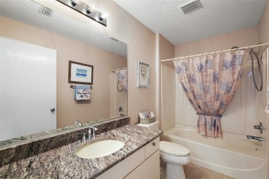 GORGEOUS, TURNKEY 2/2 Loredo with ENCLOSED, CLIMATE-CONTROLLED on The Links of Spruce Creek in Florida - for sale on GolfHomes.com, golf home, golf lot