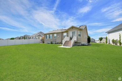 This rambler is located in a great community. Your backyard is on Cranefield Golf Course in Utah - for sale on GolfHomes.com, golf home, golf lot