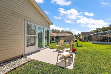 GORGEOUS, TURNKEY 2/2 Loredo with ENCLOSED, CLIMATE-CONTROLLED on The Links of Spruce Creek in Florida - for sale on GolfHomes.com, golf home, golf lot
