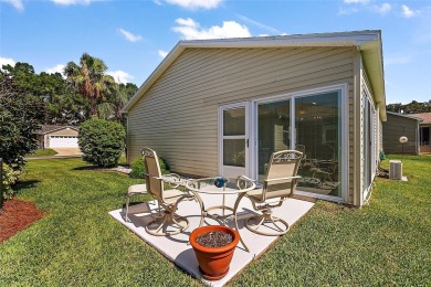 GORGEOUS, TURNKEY 2/2 Loredo with ENCLOSED, CLIMATE-CONTROLLED on The Links of Spruce Creek in Florida - for sale on GolfHomes.com, golf home, golf lot