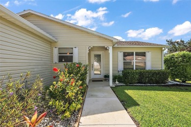 GORGEOUS, TURNKEY 2/2 Loredo with ENCLOSED, CLIMATE-CONTROLLED on The Links of Spruce Creek in Florida - for sale on GolfHomes.com, golf home, golf lot