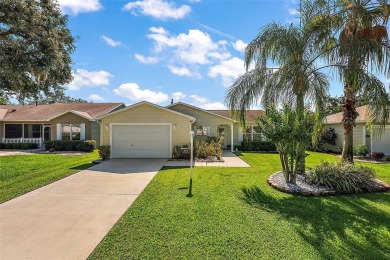GORGEOUS, TURNKEY 2/2 Loredo with ENCLOSED, CLIMATE-CONTROLLED on The Links of Spruce Creek in Florida - for sale on GolfHomes.com, golf home, golf lot