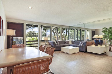 Stunning Views from this 2-Bedroom Condo with Breathtaking Golf on Boca West Golf and Country Club in Florida - for sale on GolfHomes.com, golf home, golf lot