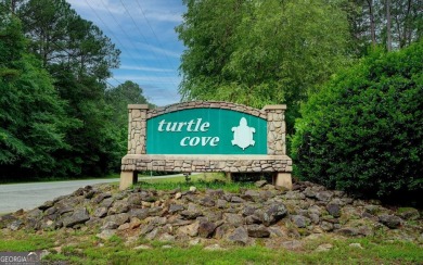 LOVE LAKE LIFE... ENJOY THE PEACEFUL AND SERIEN SETTING ON on Turtle Cove Golf Course in Georgia - for sale on GolfHomes.com, golf home, golf lot