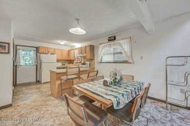 Golf-Course Living At Its Best! Well-Loved Pocono Contemporary on Pocono Farms Country Club in Pennsylvania - for sale on GolfHomes.com, golf home, golf lot