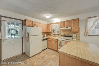 Golf-Course Living At Its Best! Well-Loved Pocono Contemporary on Pocono Farms Country Club in Pennsylvania - for sale on GolfHomes.com, golf home, golf lot