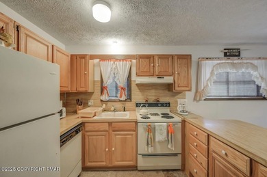 Golf-Course Living At Its Best! Well-Loved Pocono Contemporary on Pocono Farms Country Club in Pennsylvania - for sale on GolfHomes.com, golf home, golf lot