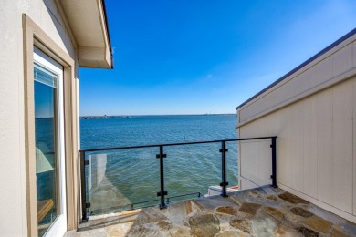 Breathtaking lake views await in this East-Facing townhome with on Horseshoe Bay Private Golf Course in Texas - for sale on GolfHomes.com, golf home, golf lot