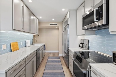 This TOTALLY RENOVATED ISLAND BEAUTY will charm the most on Links on Longboat Golf Club in Florida - for sale on GolfHomes.com, golf home, golf lot