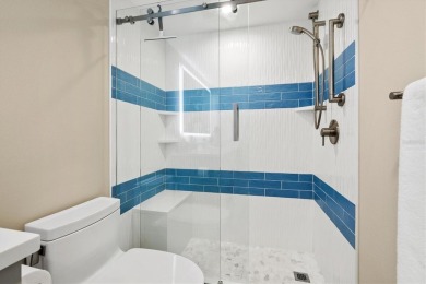 This TOTALLY RENOVATED ISLAND BEAUTY will charm the most on Links on Longboat Golf Club in Florida - for sale on GolfHomes.com, golf home, golf lot