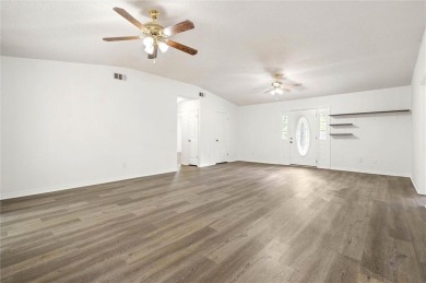 This remodeled 3-bedroom, 2-bath brick home is centrally located on Lake Forest Yacht and Country Club in Alabama - for sale on GolfHomes.com, golf home, golf lot