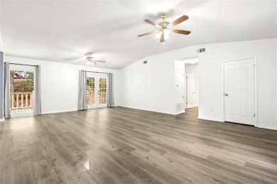 This remodeled 3-bedroom, 2-bath brick home is centrally located on Lake Forest Yacht and Country Club in Alabama - for sale on GolfHomes.com, golf home, golf lot