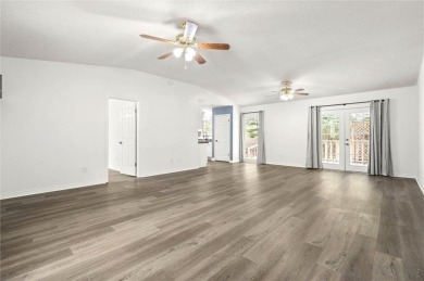 This remodeled 3-bedroom, 2-bath brick home is centrally located on Lake Forest Yacht and Country Club in Alabama - for sale on GolfHomes.com, golf home, golf lot