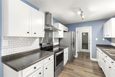 This remodeled 3-bedroom, 2-bath brick home is centrally located on Lake Forest Yacht and Country Club in Alabama - for sale on GolfHomes.com, golf home, golf lot