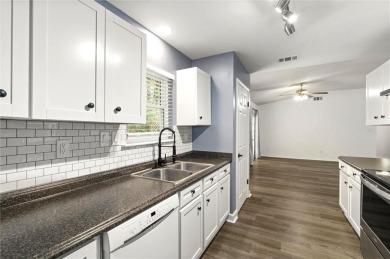 This remodeled 3-bedroom, 2-bath brick home is centrally located on Lake Forest Yacht and Country Club in Alabama - for sale on GolfHomes.com, golf home, golf lot