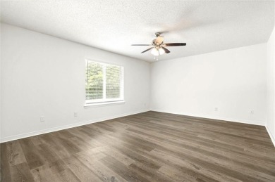 This remodeled 3-bedroom, 2-bath brick home is centrally located on Lake Forest Yacht and Country Club in Alabama - for sale on GolfHomes.com, golf home, golf lot