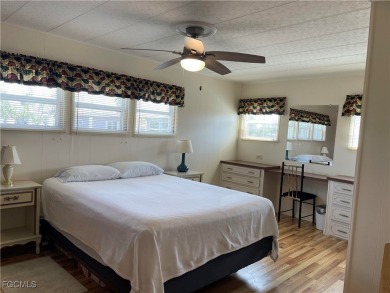 This spacious corner-lot home in Old Bridge Village, a vibrant on Riverbend Golf and Country Club in Florida - for sale on GolfHomes.com, golf home, golf lot