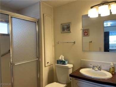 This spacious corner-lot home in Old Bridge Village, a vibrant on Riverbend Golf and Country Club in Florida - for sale on GolfHomes.com, golf home, golf lot