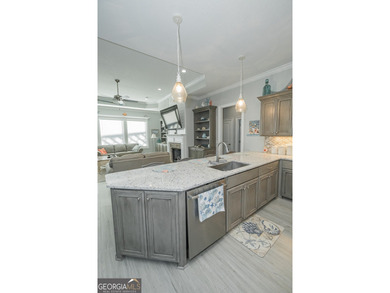 Discover luxury living in this breathtaking 4-bedroom on Laurel Island Links in Georgia - for sale on GolfHomes.com, golf home, golf lot