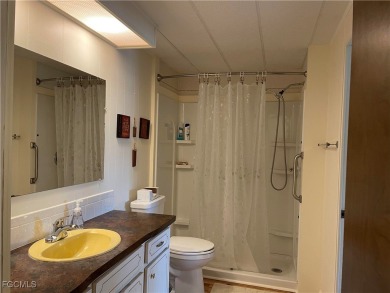 This spacious corner-lot home in Old Bridge Village, a vibrant on Riverbend Golf and Country Club in Florida - for sale on GolfHomes.com, golf home, golf lot