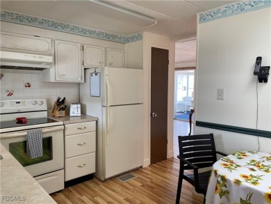 This spacious corner-lot home in Old Bridge Village, a vibrant on Riverbend Golf and Country Club in Florida - for sale on GolfHomes.com, golf home, golf lot