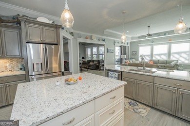 Discover luxury living in this breathtaking 4-bedroom on Laurel Island Links in Georgia - for sale on GolfHomes.com, golf home, golf lot