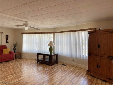 This spacious corner-lot home in Old Bridge Village, a vibrant on Riverbend Golf and Country Club in Florida - for sale on GolfHomes.com, golf home, golf lot