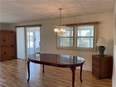 This spacious corner-lot home in Old Bridge Village, a vibrant on Riverbend Golf and Country Club in Florida - for sale on GolfHomes.com, golf home, golf lot