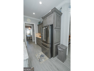 Discover luxury living in this breathtaking 4-bedroom on Laurel Island Links in Georgia - for sale on GolfHomes.com, golf home, golf lot