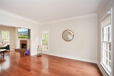 Discover this beautifully maintained home nestled in Eagle Watch on Canongate At Eagle Watch Golf Club in Georgia - for sale on GolfHomes.com, golf home, golf lot