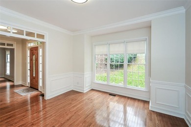 Discover this beautifully maintained home nestled in Eagle Watch on Canongate At Eagle Watch Golf Club in Georgia - for sale on GolfHomes.com, golf home, golf lot