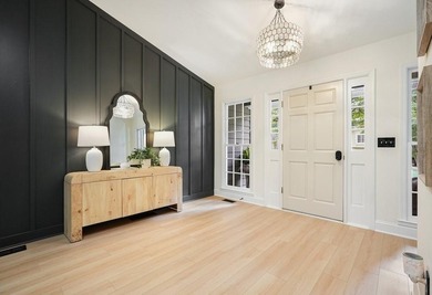 A Modern Cottage Retreat with Golf Course Views Front & Back on Canongate At Eagle Watch Golf Club in Georgia - for sale on GolfHomes.com, golf home, golf lot