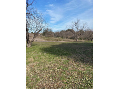 Discover the perfect setting for your custom home on this level on Slick Rock Golf Course - Horseshoe Bay in Texas - for sale on GolfHomes.com, golf home, golf lot