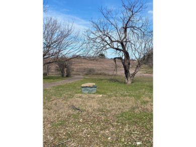 Discover the perfect setting for your custom home on this level on Slick Rock Golf Course - Horseshoe Bay in Texas - for sale on GolfHomes.com, golf home, golf lot