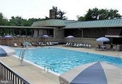 Generous $35K PRICE REDUCTION  for a very desirable unit in on Leisure World Golf Club in Maryland - for sale on GolfHomes.com, golf home, golf lot